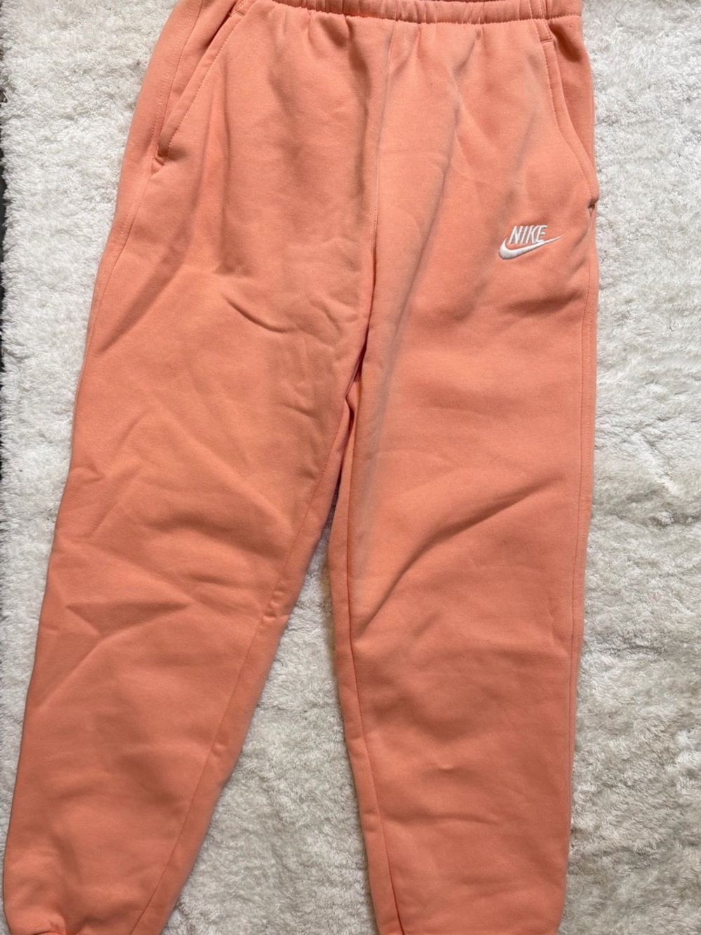Nike Kids Peach-Orange Joggers with White Swoosh